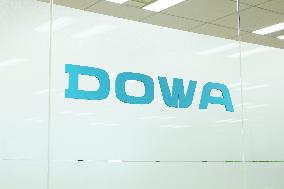 DOWA Holdings sign and logo